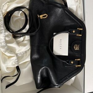Gucci Black Leather Shoulder Bag with Gold Accents